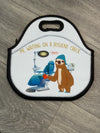 Teeth Obsessed insulated dental lunch bag with tooth design, featuring a tote style with handles and tooth-themed print.
