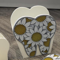 Teeth Obsessed dental vase notepad holder magnet featuring a tooth-shaped design, perfect for organizing notes on a magnetic surface.