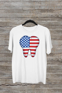 Teeth Obsessed Dental Flag Tooth T-Shirt featuring a graphic print of a tooth with a dental flag design on a casual shirt.