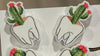 Dental earrings shaped like succulent plants from Teeth Obsessed, featuring realistic green succulent designs.