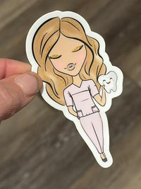 Pink dental stickers from Teeth Obsessed featuring fun tooth designs on a white background.