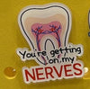 Teeth Obsessed gold tooth Bogg bag charm featuring ortho, nerves, denture, and tooth designs, perfect for accessories and bags.