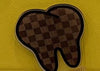 Gold Teeth Obsessed orthodontic tooth charm with nerves, denture, and tooth details, designed as a stylish bag charm or pin.