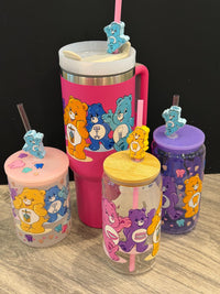 Pink and yellow Dental Bear Drinkwear cups and tumblers by Teeth Obsessed featuring playful bear designs and dental-themed toppers.