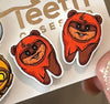 Space Tooth Earrings by Teeth Obsessed featuring dental-themed earrings with a space-inspired design, made of silver-tone metal.