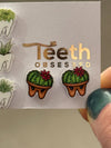 Dental earrings featuring succulent tooth designs by Teeth Obsessed, showcasing a pair of unique, silver-tone succulent tooth earrings.