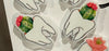 Dental earrings featuring succulent tooth designs by Teeth Obsessed, showcasing silver-tone tooth charms with green succulent accents.