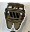 Brown car-shaped dental earrings by Teeth Obsessed featuring tooth-shaped charms and a playful automotive design.
