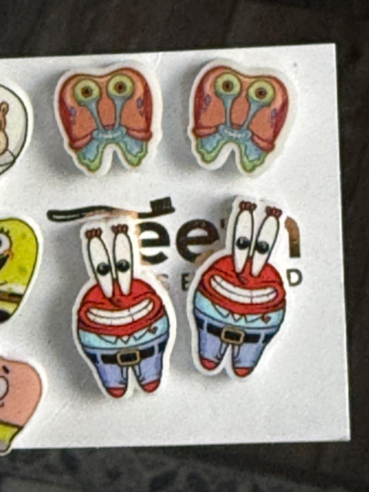 Dental Sea Teeth Earrings by Teeth Obsessed featuring crab-shaped dental earrings with sea-inspired design.