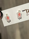 Teeth Obsessed dental earrings shaped like root canal nerves, featuring detailed tooth and nerve design for dental enthusiasts.