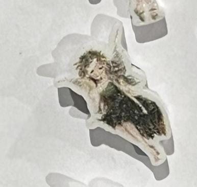 Teeth Obsessed dental earrings featuring green tooth fairy design, perfect for dental hygienists or dental-themed gift.