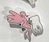 Teeth Obsessed dental earrings featuring green tooth fairy design, perfect for dental hygienists or dental enthusiasts.
