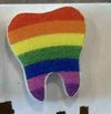 Rainbow glitter tooth earrings by Teeth Obsessed, featuring colorful dental-shaped earrings with sparkling rainbow glitter.