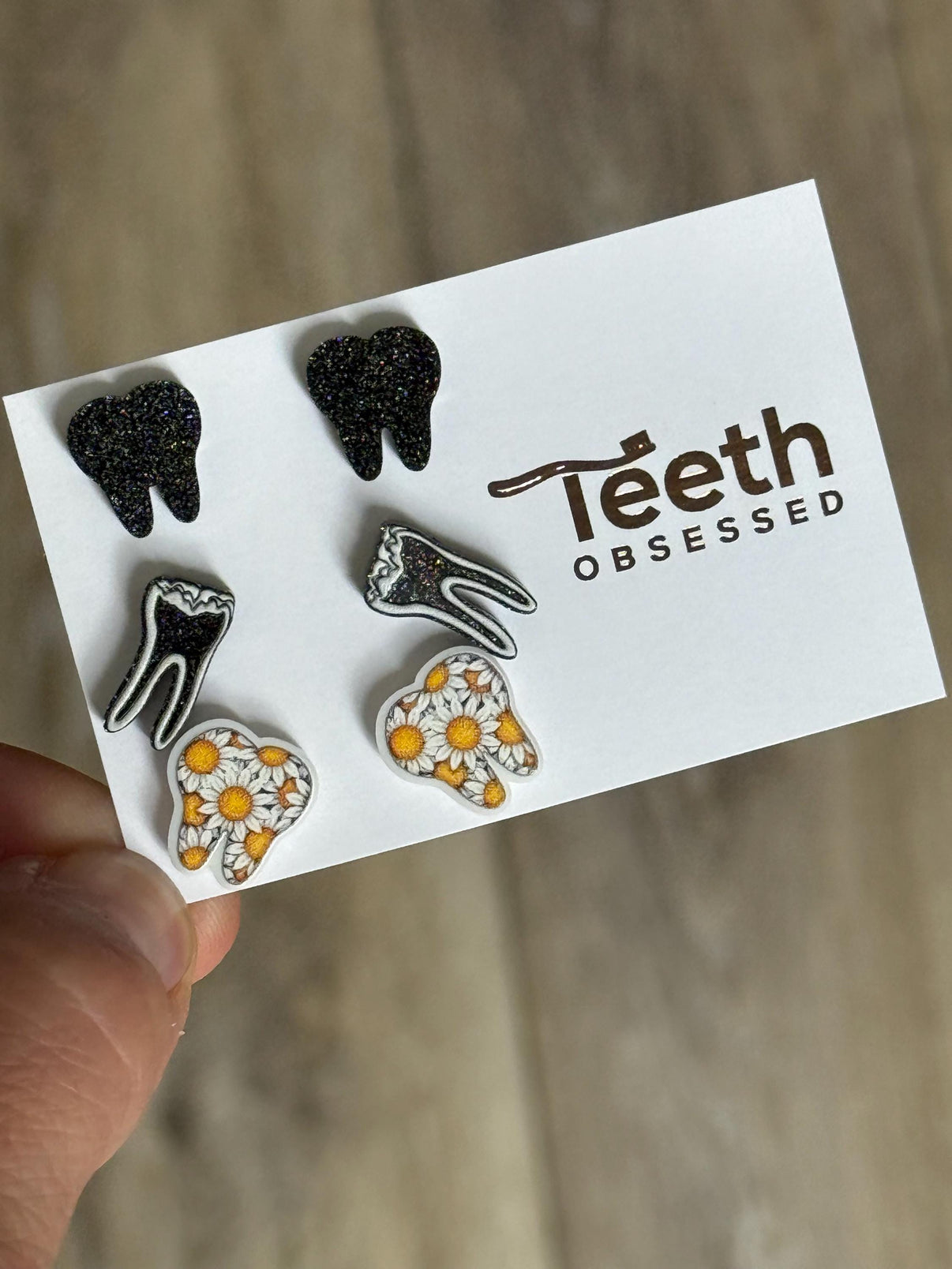 Sunflower, RCT Glitter and Black Trio Dental Earrings by Teeth Obsessed, featuring colorful dental-themed jewelry with sunflower and black accents.