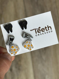 Sunflower, RCT Glitter and Black Trio Dental Earrings by Teeth Obsessed, featuring colorful dental-themed jewelry with sunflower and black accents.