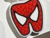 Red superhero tooth-shaped earrings by Teeth Obsessed, featuring playful dental-themed jewelry with bold design.