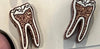 Silver RCT Tooth Earrings by Teeth Obsessed, dental-themed earrings featuring realistic tooth designs for unique jewelry style.