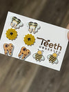 Sunflower-shaped dental earrings by Teeth Obsessed, featuring tooth designs, perfect as a dental assistant gift.
