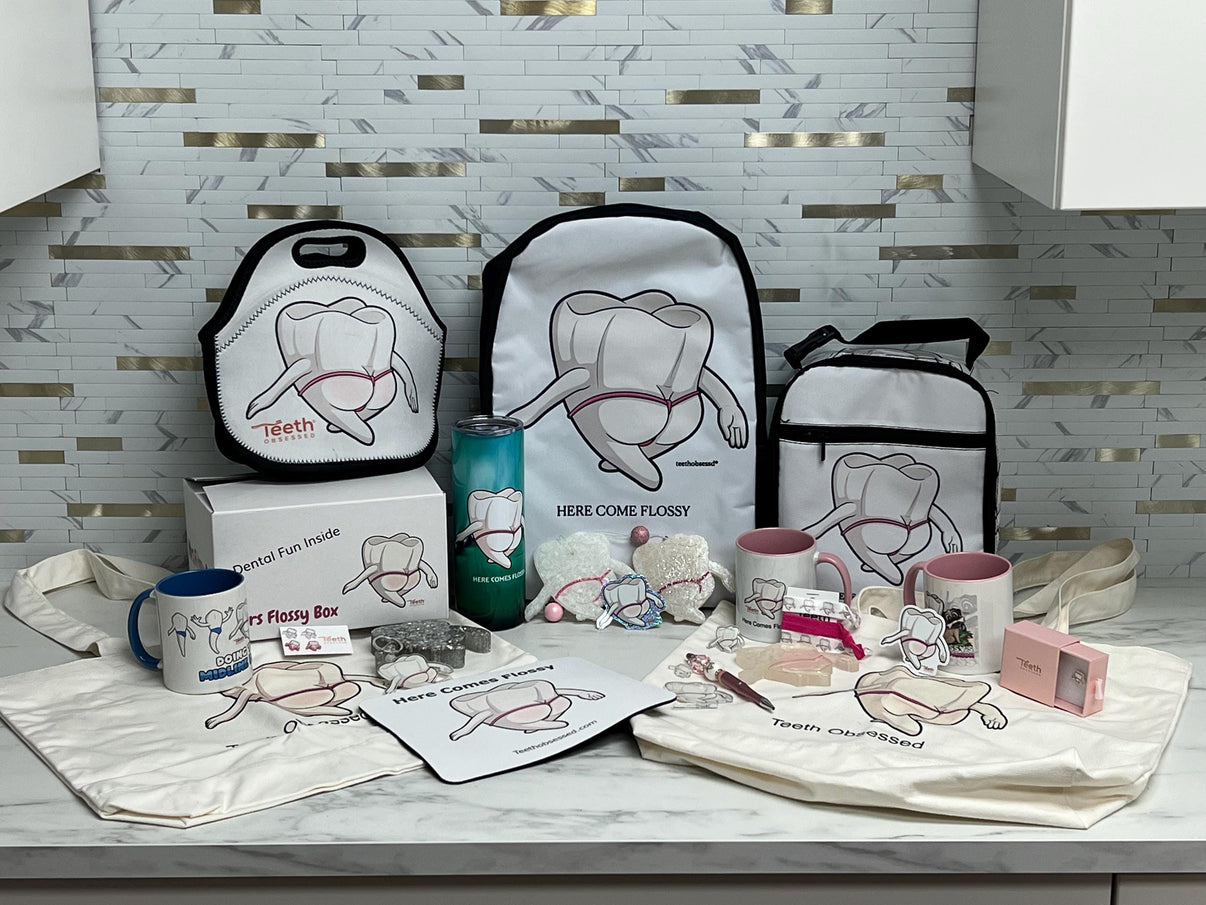 Teeth Obsessed Miss Flossy Mystery Box with dental keychains featuring colorful tooth designs and playful dental-themed accessories.