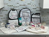 Teeth Obsessed Miss Flossy Mystery Box with dental keychains featuring colorful tooth designs and playful dental-themed accessories.