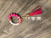 Mrs Flossy and Friends dental keychain by Teeth Obsessed featuring Flossy and a tooth character on a colorful keychain.