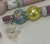 Pink and white Tooth Fairy Unicorn Bubble Pens by Teeth Obsessed, featuring playful dental-themed pen and holder with a unicorn design.