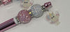 Pink and white Tooth Fairy Unicorn Bubble Pens from Teeth Obsessed, featuring playful unicorn and tooth-themed designs.