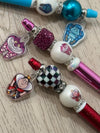 Teeth Obsessed Wonderland Tooth Bubble Pens and Holders featuring whimsical queen check design, dental pens for kids' oral care.