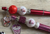 Teeth Obsessed Wonderland Tooth Bubble Pens and holders featuring whimsical queen check design, fun dental accessories for kids.