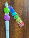 Teeth Obsessed Top Gum sunflower denture and implant dental pens with holders, featuring colorful sunflower designs and removable caps.