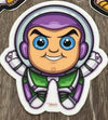 Colorful Toy Tooth Stickers by Teeth Obsessed featuring playful alien-themed dental designs for kids' dental fun.