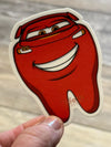 Blue car character dental sticker by Teeth Obsessed featuring a playful tooth design for kids' dental fun.