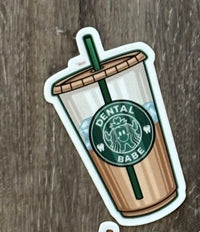 Dental stickers featuring tooth and dental-themed designs on coffee cups, by Teeth Obsessed.