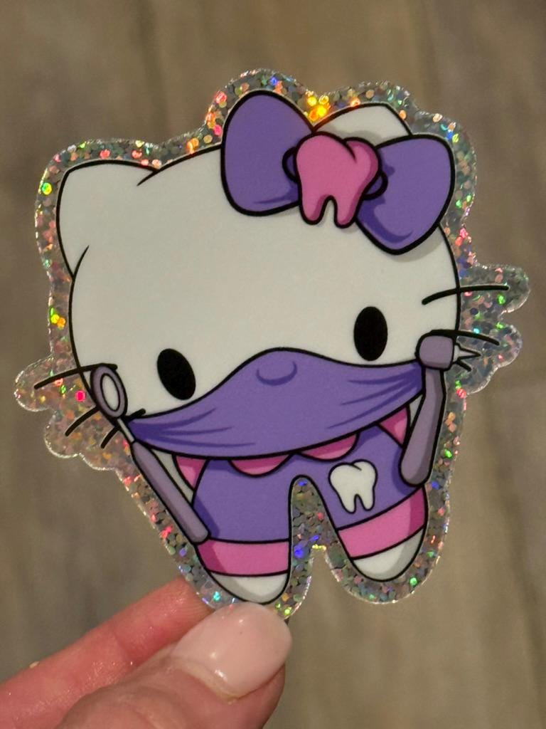 Purple glitter kitty dental hygienist sticker from Teeth Obsessed, featuring a cute feline character in a fun, sparkly design.