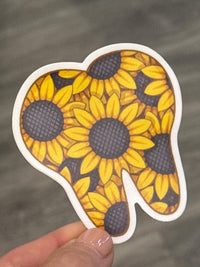 Sunflower dental sticker by Teeth Obsessed, featuring a bright sunflower design for decorating teeth or dental crafts.