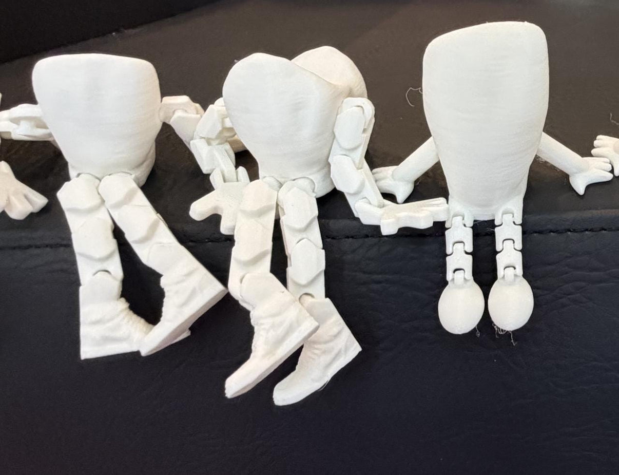 Teeth Obsessed Flossy Friends™ Anterior doll, a colorful dental-themed figure from the dolls and figures collection.