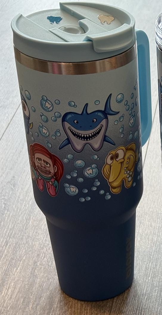 Dark blue Nautica Fish Tooth Tumbler by Teeth Obsessed, a stylish drinkware piece featuring a fish tooth design.