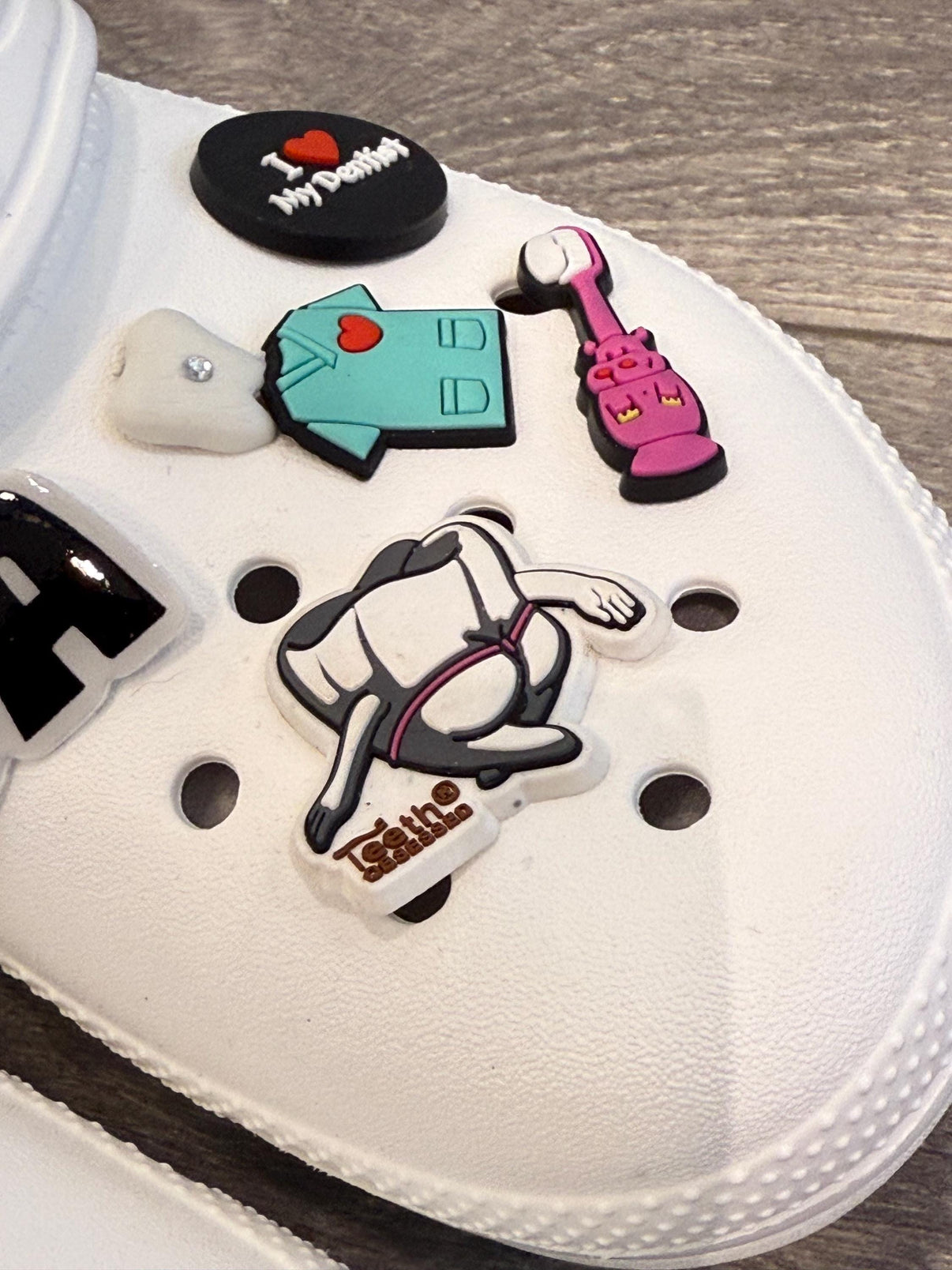 Mrs Flossy shoe charm from Teeth Obsessed drinkware collection, featuring a playful shoe design and whimsical style.