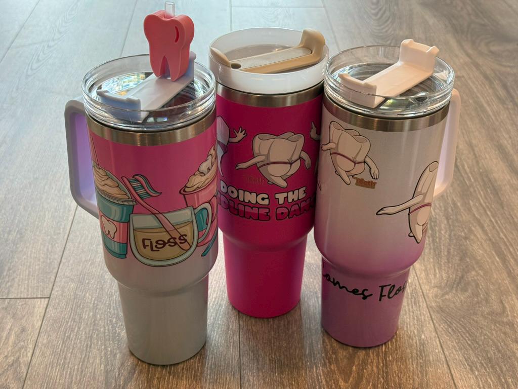 Mrs Flossy Tooth Tumblers from Teeth Obsessed, colorful drinkware featuring playful tooth-themed designs.