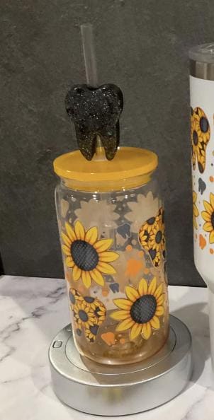 Teeth Obsessed sunflower tooth glass tumbler with charm, dental hygienist gift drinkware featuring a bright sunflower design.