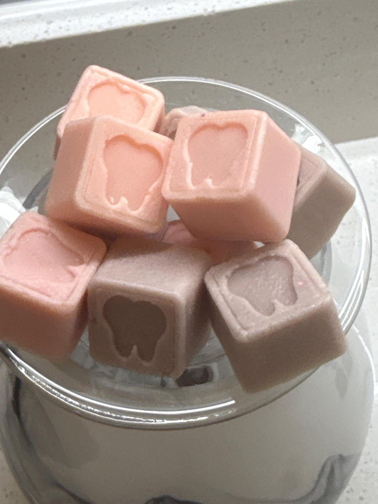 Pink Tiny Tooth Soy Wax Melts from Teeth Obsessed, dental gift freshies for vents and melts, featuring a cute tooth design.