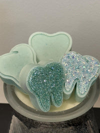 Teeth Obsessed peppermint tooth wax melts in Freshies, vents, with a bright, refreshing peppermint scent and colorful packaging.