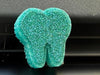 Teeth Obsessed turquoise blueberry tooth freshener and vent clips, small and regular size, for freshening car air vents.
