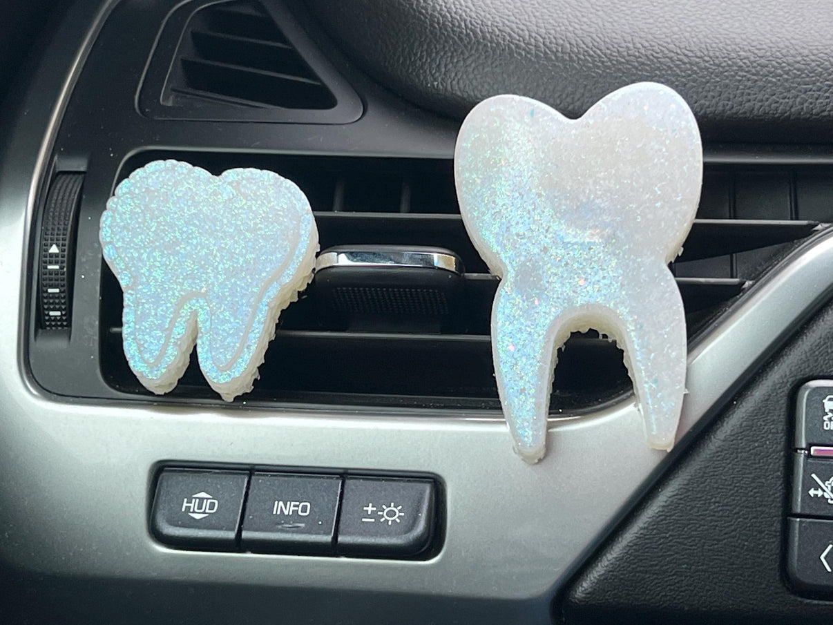 Teeth Obsessed Tooth Car Freshie vents tart with small and regular rose-shaped freshies for vehicle air freshening.