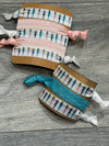 Pink Dental Besties Hair Ties and Clips by Teeth Obsessed, colorful dental-themed hair accessories for kids.