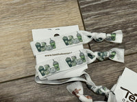 Green Coffee Trio Tooth Hair Ties by Teeth Obsessed, colorful elastic hair ties with coffee-themed design.