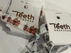 Green Coffee Trio Tooth Hair Ties by Teeth Obsessed, elastic hair ties with tooth design in a set of three.