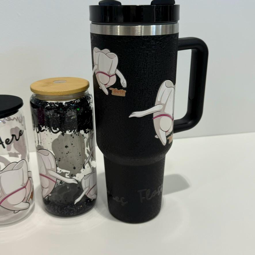 Mrs Flossy black dental tumbler by Teeth Obsessed, personalized dentist gift, featuring the Mrs Flossy logo and clean design.