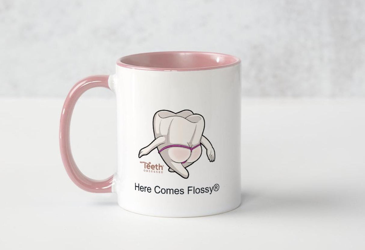 Mrs Flossy coffee cup by Teeth Obsessed featuring a cute design with Mrs Flossy branding and colorful illustrations.