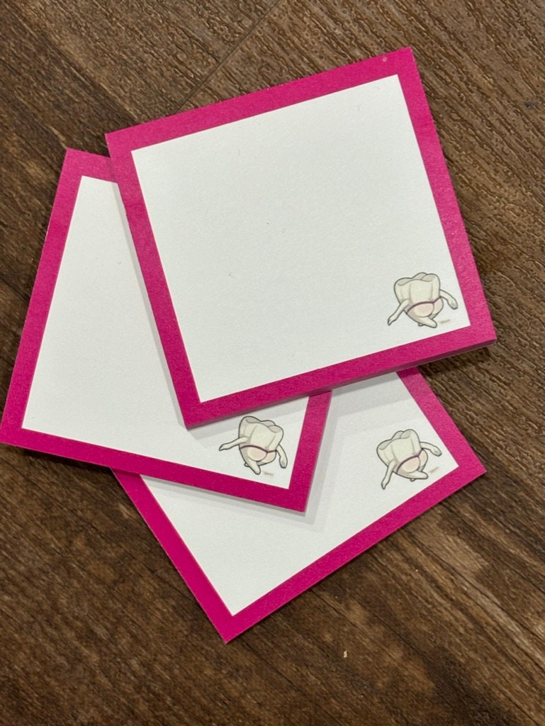 Mrs. Flossy Dental Notepad holder with magnet, featuring a playful teeth design, for organizing dental notes and reminders.
